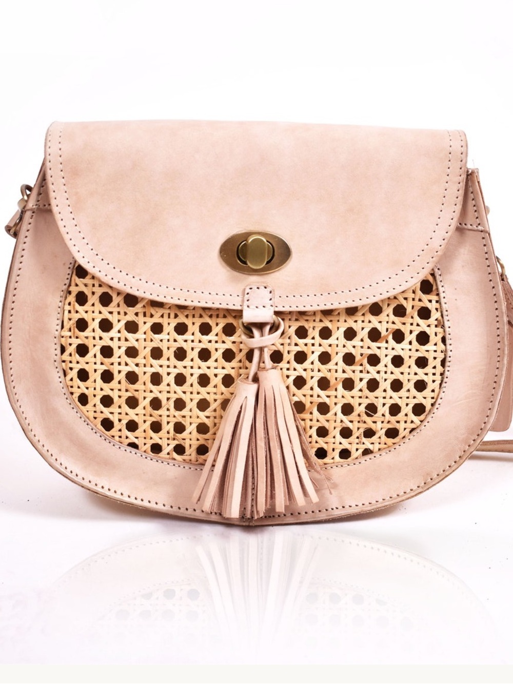 Natural/pink beige rattan saddle bag handmade in Indonesia
